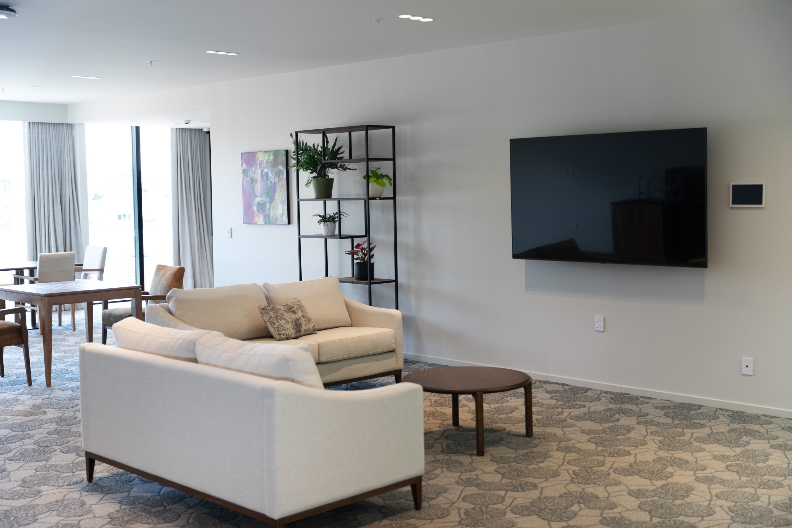 Upper level communal lounge with television